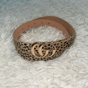 Leopard print belt with gold buckle